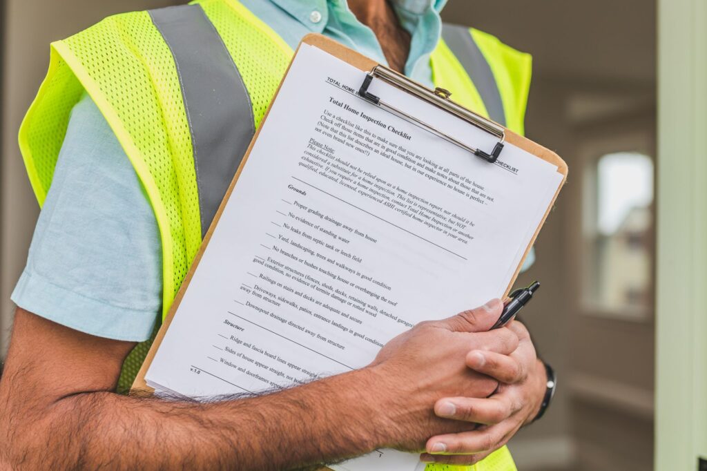 Notebook checklist for organizing settlement tasks after moving to Canada