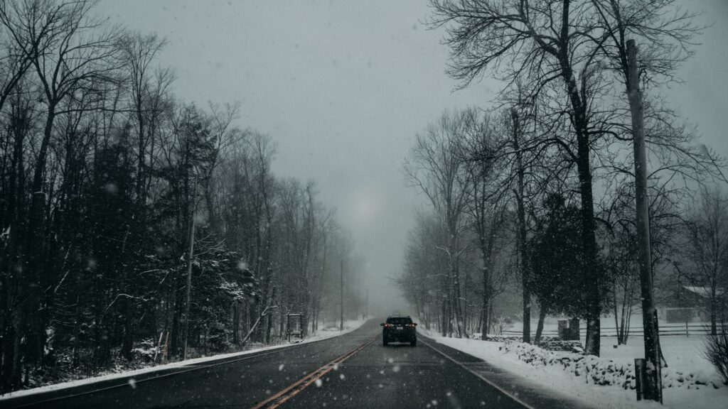 Snow-covered road in Ontario during winter driving conditions