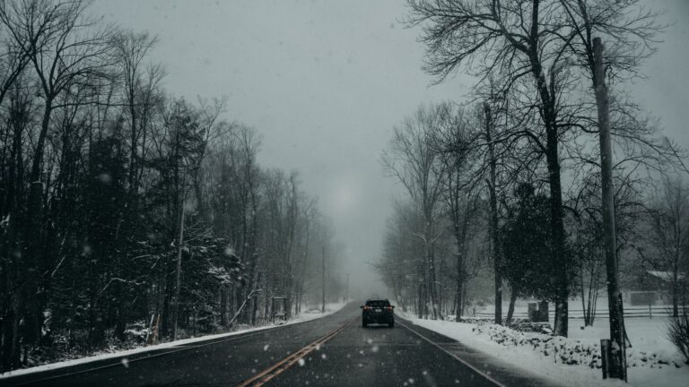 Snow-covered road in Ontario during winter driving conditions